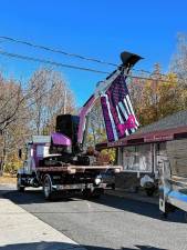 Raising the breast cancer awareness flag.