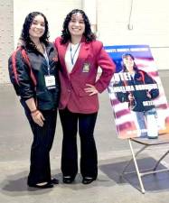 Angelina Rodriguez (right) with her sister and manager Arianna (left).