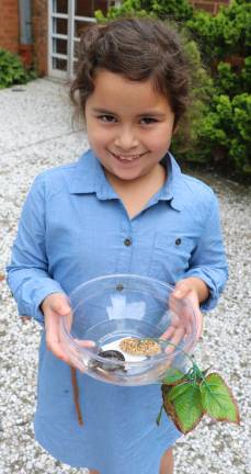 Genesis Martinez, 8, brought her pet turtle, &quot;Mr. T.&quot;