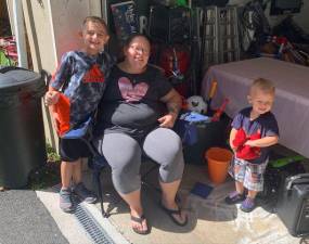 Cassandra Beach with her stepson Sebastian and son Remi.