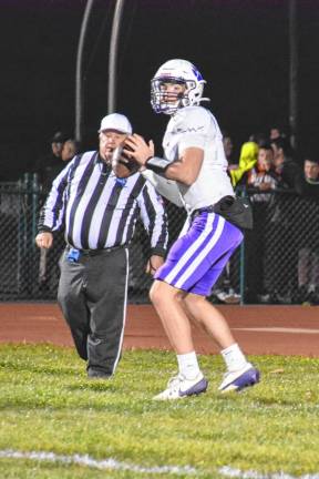 Warwick senior quarterback Brody Frederick throws an early touchdown pass to Ryan Sullivan, but the Wildcats come up short vs Minisink to finish the regular season 8-1.