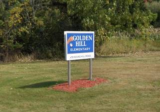 The sign for Golden Hill Elementary off Round Hill Road in Florida.