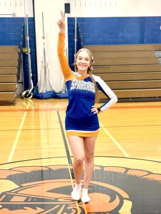 Sophomore Georgia Maesano is on the varsity cheer team.