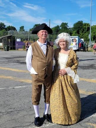 George and Martha Washington will be there!