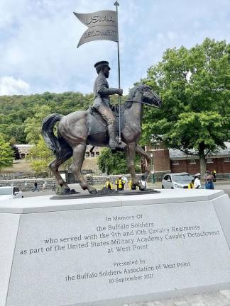 Staff Sergeant Sanders H. Matthews, Sr. sits atop the now year-old Buffalo Soldier Monument at West Point.