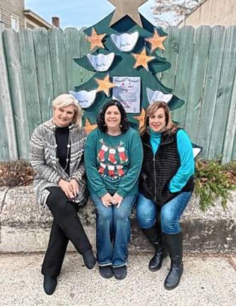 L-R: Jennifer DiCostanzo, Corrine Iurato, and Tiffany Megna in front of the Angel Tree.