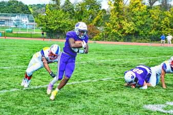 Junior running back Aaron Callender, #14, is one of many juniors who have made a significant impact on the 2024 Wildcat football team.