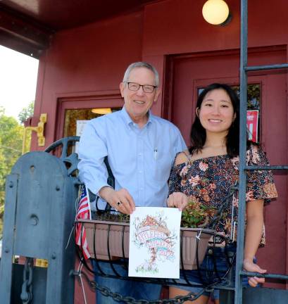 Photos by Roger Gavan In the adult category, first prize was awarded to Erin Jung, pictured with Warwick Valley Chamber of Commerce Executive Director Michael Johndrow.