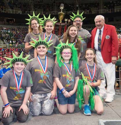 Members of the Middle School Team, standing from left to right, are: Coach Michelle Amato, Aiden Woods, Sasha Blanchard, Coach JB DiCarlantonio and Dr. Sam Micklus; and in front: Stephen D'Ambrosio, Kyle Gutierrez, Mary Hoey and Kayla Amato.