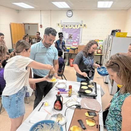 Making pancakes as part of the Extended School Year program.