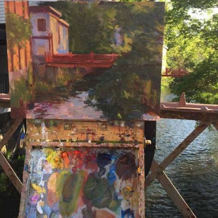 One of Howard-Fatta's favorite locations in the Village of Warwick is the red foot bridge over theWawayanda Creek. She paints each Wednesday morning.