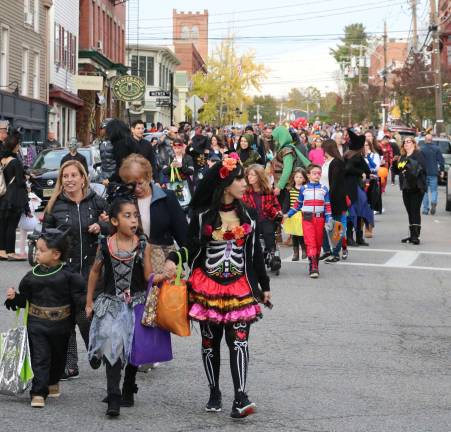 Photos by Roger Gavan On Wednesday evening, Oct. 31, unseasonable temperatures in the mid 60s and sunny skies contributed to what was likely the largest crowd to date participating in the annual Halloween Parade.