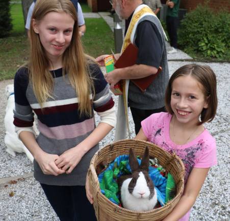 Gabriella Brezina, 13, and her sister Anika, 9, brought their pet rabbit, &quot;Hershey.&quot;