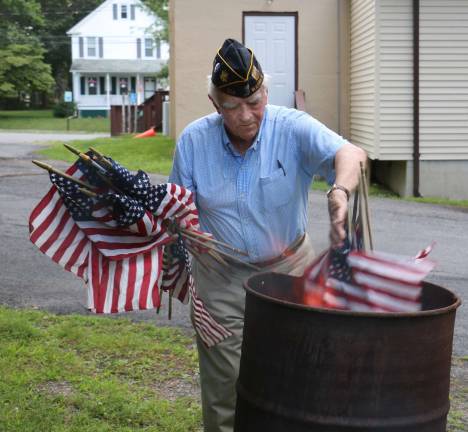 Robert Fletcher was one of the members of Warwick&#x2019;s American Legion Post 214 performing one of its most important annual functions, a ceremonial American Flag burning behind their building on Forester Avenue.