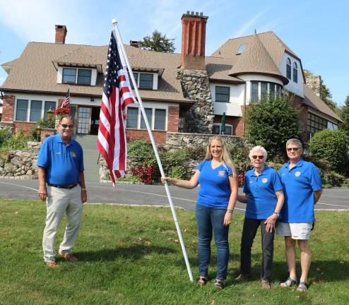 Photo by Roger Gavan The Warwick Valley Rotary Club is supporting a new tribute/fund raiser called Flags for Heroes. Pictured from left to right are: Rotarians Stan Martin, Laura Barca, Jini Mazza-Loomis and Warwick Valley Rotary Club President Dave Eaton.