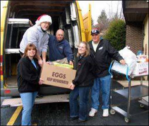 Warwick Ecumenical Council distributes 255 Christmas food baskets