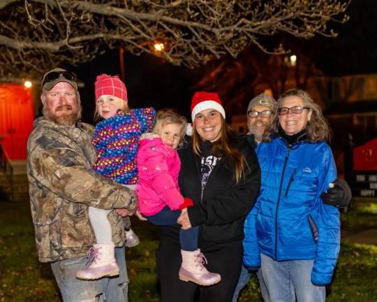 The Knuth and Palmer families at the Holiday Light Parade in Chester, N.Y. (Photo by Sammie Finch)