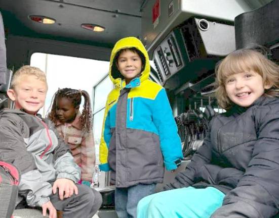 Students inside one of the fire department vehicles.