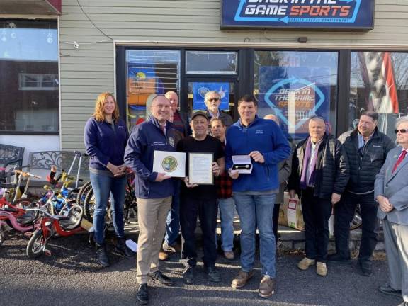 Back in the Game Sports owner Robbie Jacobs with Warwick Town Supervisor Jesse Dwyer and Florida Mayor Daniel Harter Jr.