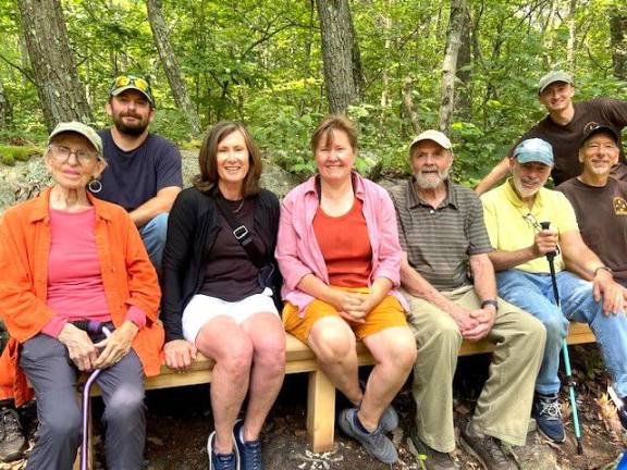 Local artist Jessica Wickham (center) with members of OCLT and friends of Gretchen Gibbs.