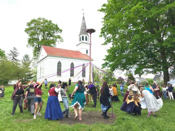 Beltane participates gather around the maypole in Lewis Park on Saturday, May 11.