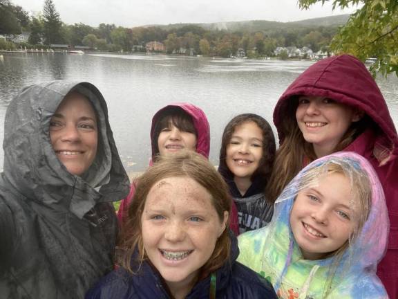 Lori Brennan with a few scouts at the lake.