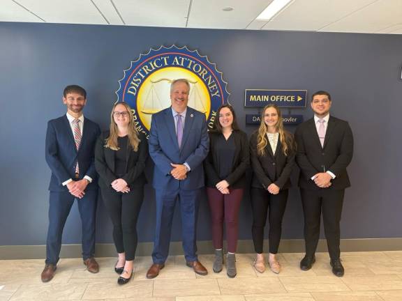 Orange County District Attorney David Hoovler, third from left, with new assistant district attorneys.