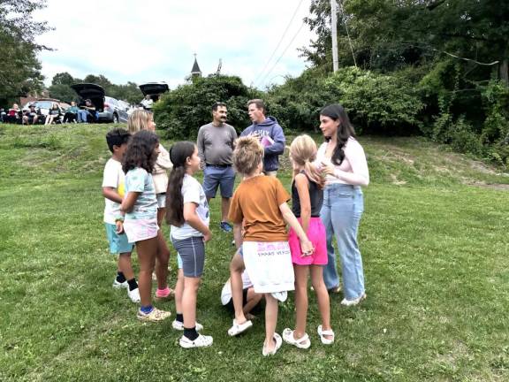 Fans gather around Julia Roome before her evening performance.