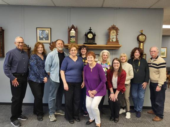 People for People Fund Executive Director Marsi Clark, fourth from left, with volunteers.