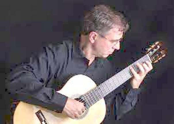 Charles Mokotoff on guitar.