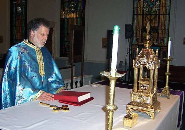 Fr. George Kevorkian, pastor of St. Ignatius Antiochian Orthodox Church in the Village of Florida, celebrates Pascha (Easter).