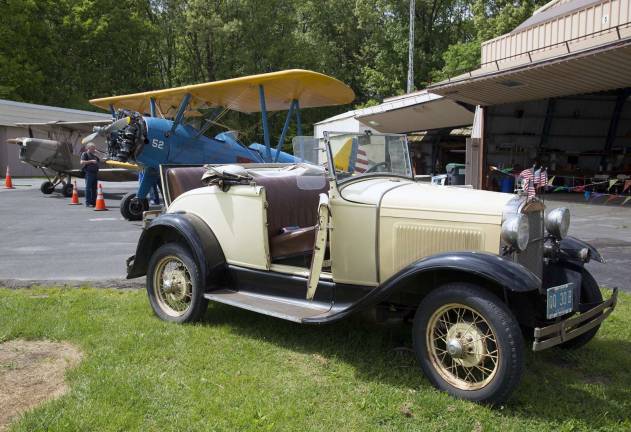 Photo by Robert G. Breese A few planes and an antique car were also on diplay at the Warwick Airport Takeover car show on Sunday.