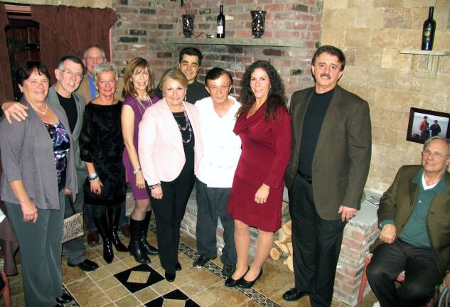 Photo by Roger Gavan From left, Deborah and Michael Sweeton, Town of Warwick supervisor; Michael Johndrow, executive director of the Warwick Valley Chamber of Commerce; Sue Filingeri, Jacqueline Johndrow, Greenwood Lake Mayor Barbara Moore, Chris Rapaj, West Milford Mayor Bettina Bieri, Joseph Filingeri and James Moore. Present at the dinner but not available for the photo: West Milford Township Administrator Nancy Gage.