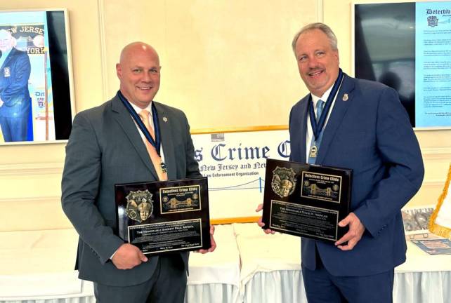 Orange County Sheriff Paul Arteta, left, and Orange County District Attorney David Hoovler receive Outstanding Law Enforcement Executives Awards.