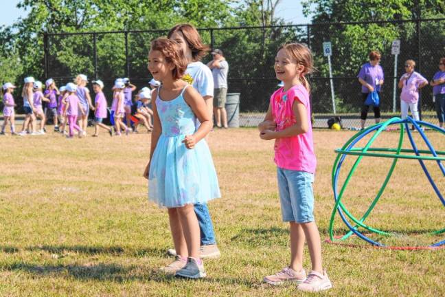 Golden Hill students having fun trying to knock down each other’s hula hoops “castles.”