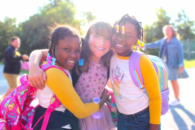 Students were happy to see their friends again on the first day back to school.