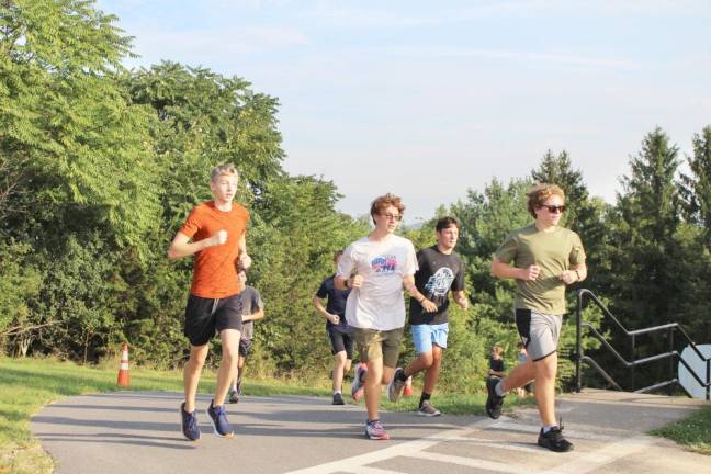 The Spartans cross-country team gets ready for the season.