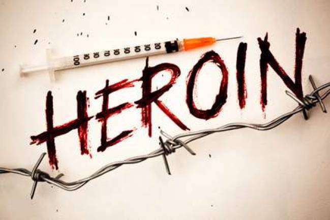 Photo illustration The first of two countywide forums on the heroin epidemic gripping the area will take place Tuesday, Oct. 3, at 6:30 p.m., in the Monroe-Woodbury High School Auditorium.