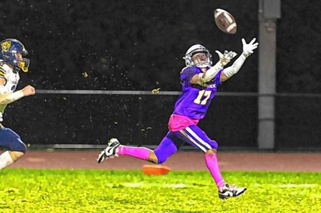 Wildcat wide-receiver Anthony Mazza reaches for the ball.