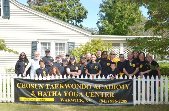 The Chosun Taekwondo Academy Leadership Team with Director Kara Greh, Warwick Mayor Michael Newhard and Warwick Town Supervisor Michael Sweeton.