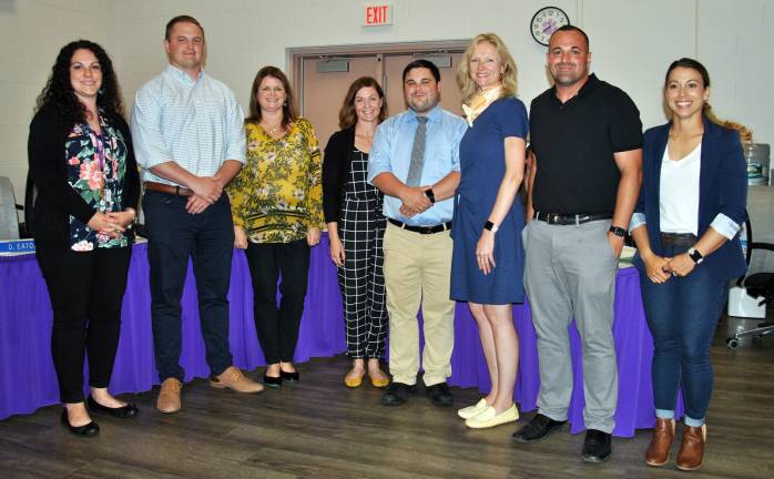 Provided photo The Warwick Valley School Board recognized and congratulated faculty members who have been recommended for. Pictured from left to right are: Lillian C. Gaytan Castro, William C. Menkens, Marguerite R. Fusco, Margaret T. Wright, Mark J. Botta,Ineka Menken Pirovitz, Eric D. Rosaand Kaitlin N. Rodriguez.