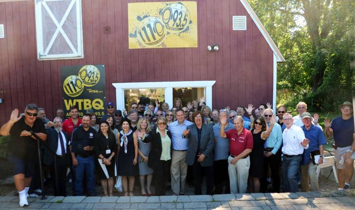 Photo by Roger Gavan WTBQ celebrated 25 years of ownership on July 1. Those pictured in the photo include Orange County Executive Steve Neuhaus, who just returned from serving seven months in Iraq and the Middle East in the Navy Reserves. Also pictured are Assemblyman Colin Schmitt, Warwick Supervisor Michael Sweeton, Town of Pompton Lakes, N.J., Supervisor Kevin Boyle, Mayor Michael Newhard, Bob Caridi, president of the Nam Knights, Orange County Sheriff Carl DuBois, Deb Major, president of Zylofone, Helene Guss, director of Communication of Bon Secours Charity Health System, Orange County Legislator Paul Ruszkiewicz, Town of Monroe Supervisor Tony Cardone and numerous other officials, dignitaries, businesspersons, advertisers and members of several local Chambers of Commerce.