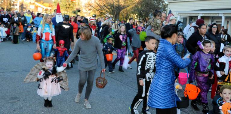 Photos by Roger GavanOn Tuesday evening, Oct. 31, the weather had changed to more seasonable and chilly temperatures but that didn&#x2019;t prevent another record-breaking crowd from participating in the annual Halloween Parade.