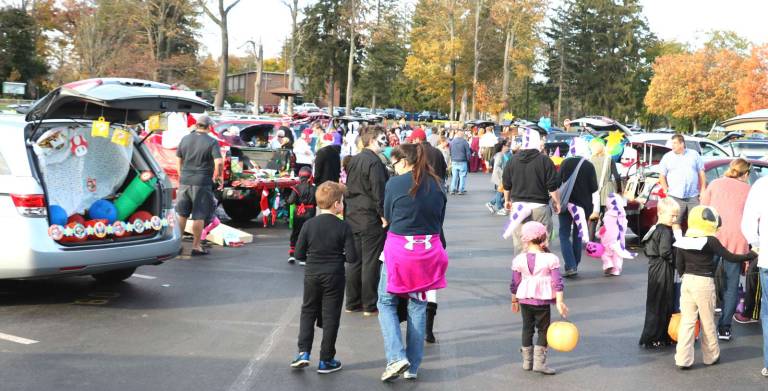Photos by Roger Gavan On Saturday, Oct. 28, ghosts, goblins, witches, an assortment of movie, book, cartoon and other characters assembled in the Warwick Middle School parking lot for the second annual &#x201c;Trunk or Treat.&#x201d;