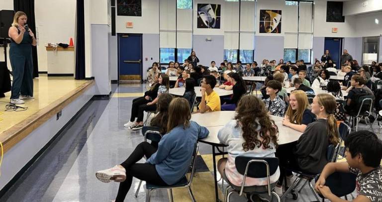 Kaila Mullady performs for Florida students.