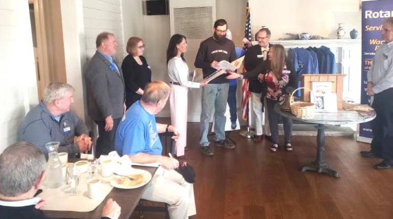 L-R: Ed and Susan Lynch, sponsors of the new members; Tara Jordan; Orion Blake; Warwick Rotary Co-President-elect David Dempster; membership chair Laurene Iammatteo; and incoming District 7210 Governor Leo Kayes, who performed the installation service.