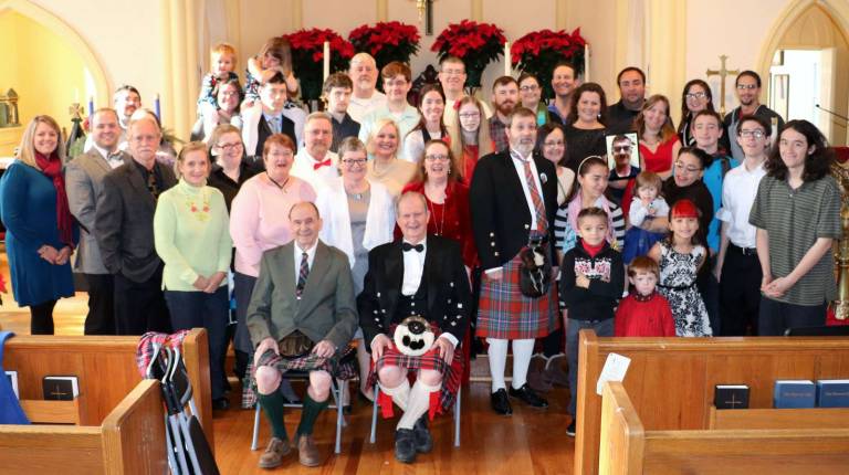 Photos by Roger Gavan After attending a Christmas service at Christ Episcopal Church on South Street, the family gathered for photographs with Don McFarland, just turned 90, (right) and his brother Warren, age 92.