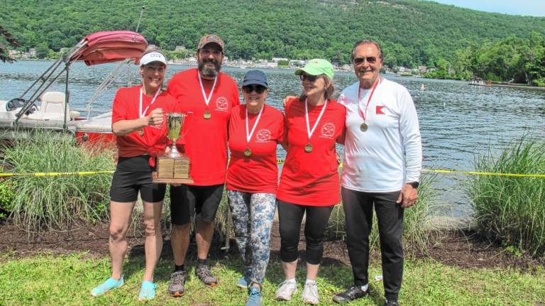 Winners of the Alex Emodi Memorial Cup for a four-person rowing team and coxswain. Rowers included Mathew Sorrell, Patricia Aspera-Wright, Christine Carter and Patricia Hallman, with coaching by Anthony Paterno.